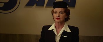 Movie still from “42” (2013), directed by Brian Helgeland – An older woman in a black suit and a hat; Close Up shot, Low angle