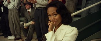 Movie still from “42” (2013), directed by Brian Helgeland – A woman that is posing for a picture; Close Up shot, Over the shoulder angle