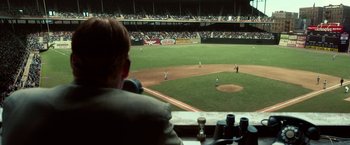 Movie still from “42” (2013), directed by Brian Helgeland – A baseball game is being played in a stadium; Extreme Wide shot, High angle