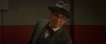 Movie still from “42” (2013), directed by Brian Helgeland – An older man wearing a hat and a suit; Close Up shot, Low angle