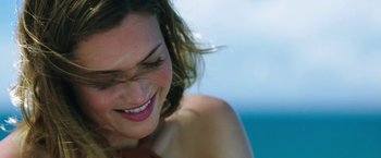 Movie still from “47 Meters Down” (2017), directed by Johannes Roberts – A woman's face with the ocean in the background; Close Up shot, Over the shoulder angle
