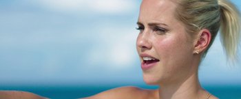 Movie still from “47 Meters Down” (2017), directed by Johannes Roberts – A beautiful young woman with a bare shoulder; Close Up shot, Low angle