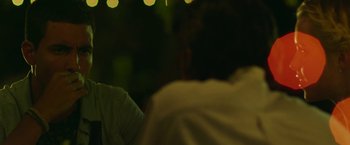 Movie still from “47 Meters Down” (2017), directed by Johannes Roberts – A person sitting on a bed in a room; Close Up shot, Over the shoulder angle