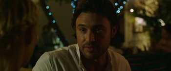 Movie still from “47 Meters Down” (2017), directed by Johannes Roberts – A person wearing a white shirt; Close Up shot, Over the shoulder angle