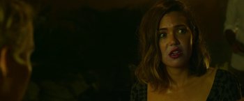 Movie still from “47 Meters Down” (2017), directed by Johannes Roberts – A person with short brown hair; Close Up shot, High angle