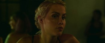 Movie still from “47 Meters Down” (2017), directed by Johannes Roberts – A woman with blonde hair is looking at the camera; Close Up shot, Low angle