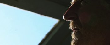 Movie still from “47 Meters Down” (2017), directed by Johannes Roberts – A person with a beard; Extreme Close Up shot, Low angle