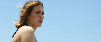 Movie still from “47 Meters Down” (2017), directed by Johannes Roberts – A person with a sky in the background; Close Up shot, Low angle