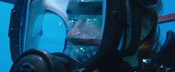 Movie still from “47 Meters Down” (2017), directed by Johannes Roberts – A shark is swimming in the water; Close Up shot, Overhead angle