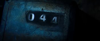 Movie still from “47 Meters Down” (2017), directed by Johannes Roberts – The numbers 0 4 4 on the back of a meter; Extreme Close Up shot, High angle
