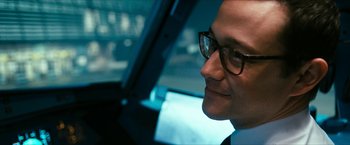 Movie still from “7500” (2019), directed by Patrick Vollrath – A person wearing glasses; Close Up shot, Over the shoulder angle