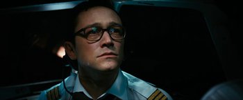 Movie still from “7500” (2019), directed by Patrick Vollrath – A person wearing a uniform; Close Up shot, High angle