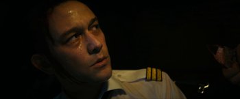 Movie still from “7500” (2019), directed by Patrick Vollrath – A person wearing a uniform; Close Up shot, High angle