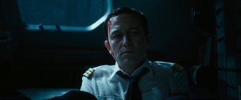 Movie still from “7500” (2019), directed by Patrick Vollrath – A man in a white shirt and a black tie; Close Up shot, Low angle