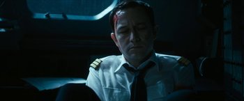 Movie still from “7500” (2019), directed by Patrick Vollrath – A man in a uniform with a bandage on his head; Close Up shot, High angle