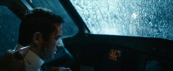 Movie still from “7500” (2019), directed by Patrick Vollrath – A man sitting in the cockpit of an airplane; Close Up shot, Low angle