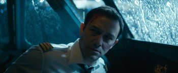 Movie still from “7500” (2019), directed by Patrick Vollrath – A person wearing a shirt and tie; Close Up shot, High angle