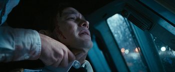 Movie still from “7500” (2019), directed by Patrick Vollrath – A man in a car with a neck injury; Close Up shot, Low angle