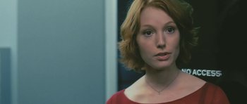 Movie still from “88 Minutes” (2007), directed by Jon Avnet – A person with short hair; Close Up shot, Over the shoulder angle