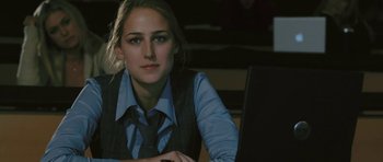 Movie still from “88 Minutes” (2007), directed by Jon Avnet – A woman sitting in front of an open laptop computer; Close Up shot, Over the shoulder angle