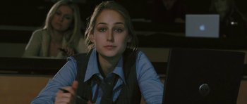 Movie still from “88 Minutes” (2007), directed by Jon Avnet – A woman sitting in front of a laptop computer; Close Up shot, Over the shoulder angle