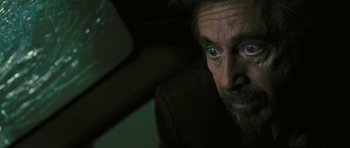 Movie still from “88 Minutes” (2007), directed by Jon Avnet – A person looking at the camera; Close Up shot, Low angle