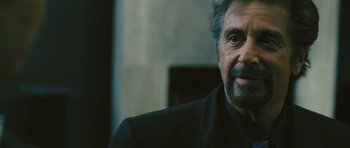 Movie still from “88 Minutes” (2007), directed by Jon Avnet – A person wearing a suit; Close Up shot, Over the shoulder angle