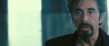Movie still from “88 Minutes” (2007), directed by Jon Avnet – A person wearing a suit and tie; Close Up shot, Over the shoulder angle