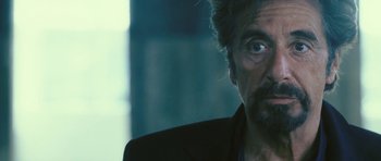 Movie still from “88 Minutes” (2007), directed by Jon Avnet – A person wearing a suit and tie; Close Up shot, Over the shoulder angle