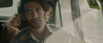 Movie still from “A Death in the Gunj” (2016), directed by Konkona Sen Sharma – A person in a car; Close Up shot, Over the shoulder angle