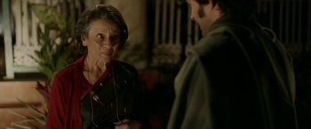 Movie still from “A Death in the Gunj” (2016), directed by Konkona Sen Sharma – An older woman and a younger man are talking to each other; Close Up shot, Over the shoulder angle