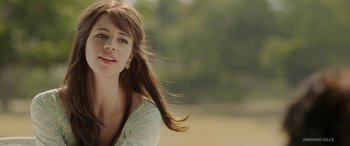 Movie still from “A Death in the Gunj” (2016), directed by Konkona Sen Sharma – A beautiful young woman with long brown hair; Close Up shot, Low angle