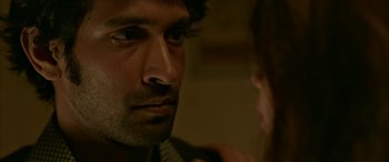 Movie still from “A Death in the Gunj” (2016), directed by Konkona Sen Sharma – A person looking at another person; Close Up shot, Over the shoulder angle