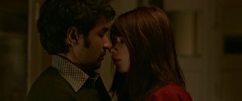 Movie still from “A Death in the Gunj” (2016), directed by Konkona Sen Sharma – A man and a woman are looking into each others eyes; Close Up shot, Low angle