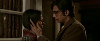 Movie still from “A Death in the Gunj” (2016), directed by Konkona Sen Sharma – A man and a woman looking at one another; Close Up shot, Low angle