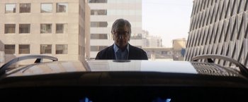 Movie still from “A Fantastic Woman” (2017), directed by Sebastián Lelio – An older man sitting in front of a piano; Medium shot, Over the shoulder angle