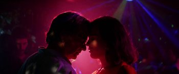 Movie still from “A Fantastic Woman” (2017), directed by Sebastián Lelio – A man and a woman face to face in a dark room; Close Up shot, Low angle