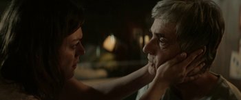 Movie still from “A Fantastic Woman” (2017), directed by Sebastián Lelio – An older man and a younger woman looking at each other; Close Up shot, Over the shoulder angle