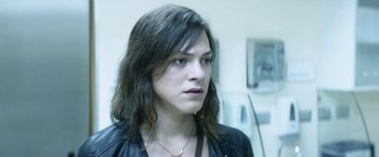 Movie still from “A Fantastic Woman” (2017), directed by Sebastián Lelio – A person with long hair; Close Up shot, Over the shoulder angle