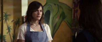 Movie still from “A Fantastic Woman” (2017), directed by Sebastián Lelio – A woman standing in front of a painting in an art studio; Close Up shot, Low angle