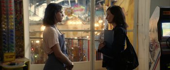 Movie still from “A Fantastic Woman” (2017), directed by Sebastián Lelio – Two women standing in front of a store window; Medium shot, Over the shoulder angle