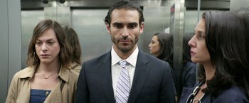 Movie still from “A Fantastic Woman” (2017), directed by Sebastián Lelio – A person wearing a suit and a tie; Close Up shot, Low angle