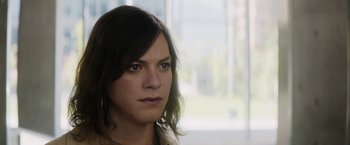 Movie still from “A Fantastic Woman” (2017), directed by Sebastián Lelio – A person wearing a white shirt; Close Up shot, Over the shoulder angle