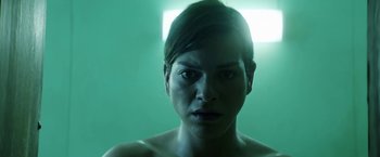 Movie still from “A Fantastic Woman” (2017), directed by Sebastián Lelio – A person in a green room; Close Up shot, Low angle