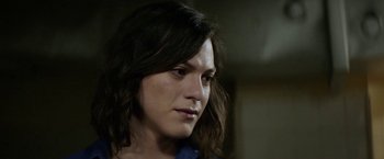 Movie still from “A Fantastic Woman” (2017), directed by Sebastián Lelio – A person with long black hair; Close Up shot, Over the shoulder angle