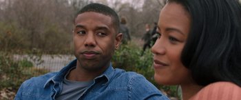Movie still from “A Journal for Jordan” (2021), directed by Denzel Washington – A man and a woman looking at each other; Close Up shot, Over the shoulder angle