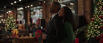 Movie still from “A Journal for Jordan” (2021), directed by Denzel Washington – A man and a woman standing next to each other; Medium shot, Over the shoulder angle