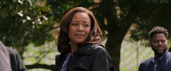 Movie still from “A Journal for Jordan” (2021), directed by Denzel Washington – A person wearing a jacket; Close Up shot, Low angle