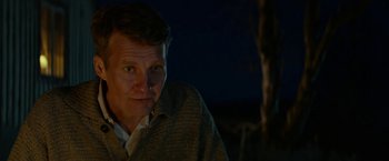 Movie still from “A Man Called Ove” (2015), directed by Hannes Holm – A person wearing a sweater; Close Up shot, Over the shoulder angle