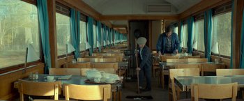 Movie still from “A Man Called Ove” (2015), directed by Hannes Holm – A man sweeping the floor in a restaurant; Wide shot, High angle